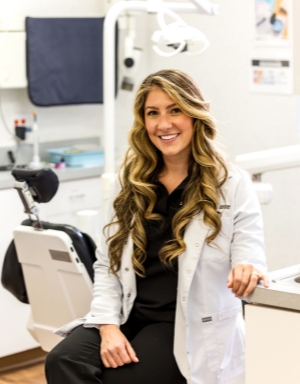 man with glasses smiling