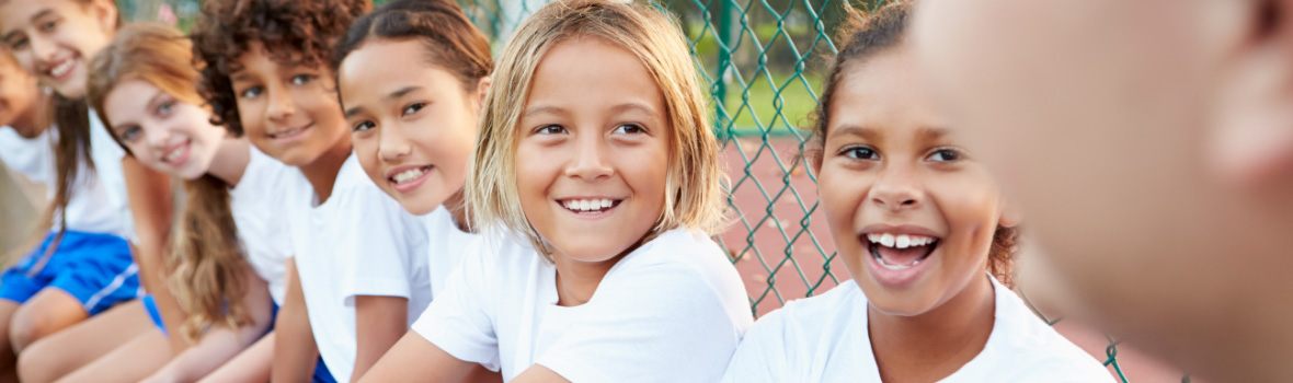 group of children smiling and laughing