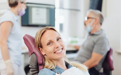 Woman smiling in the dental chair