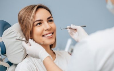 Woman smiling during dental exam