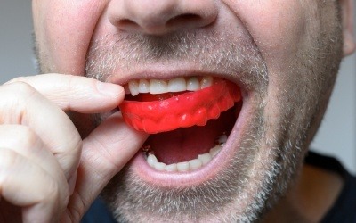 Man using mouthguard