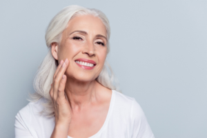 a person with dental implants smiling 