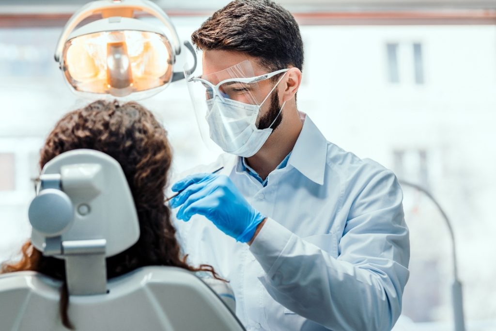 person receiving a tooth extraction