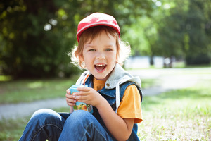 Young child with a juice box